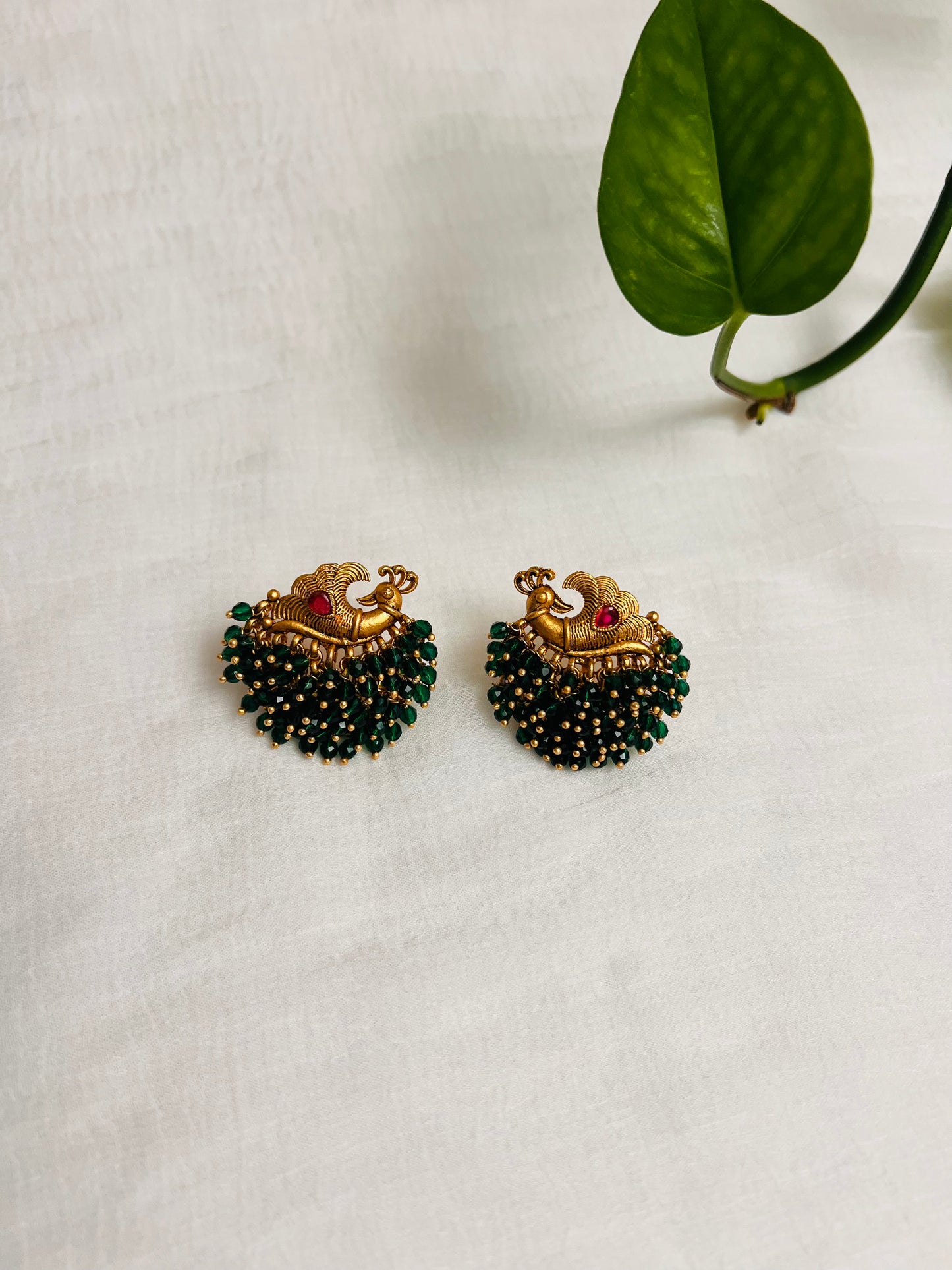 Green beads and golden antique studs with matte finish | Indian golden earring with peacock